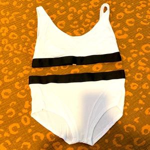 Lunya sleep bralette and boy shirt set in white/black.